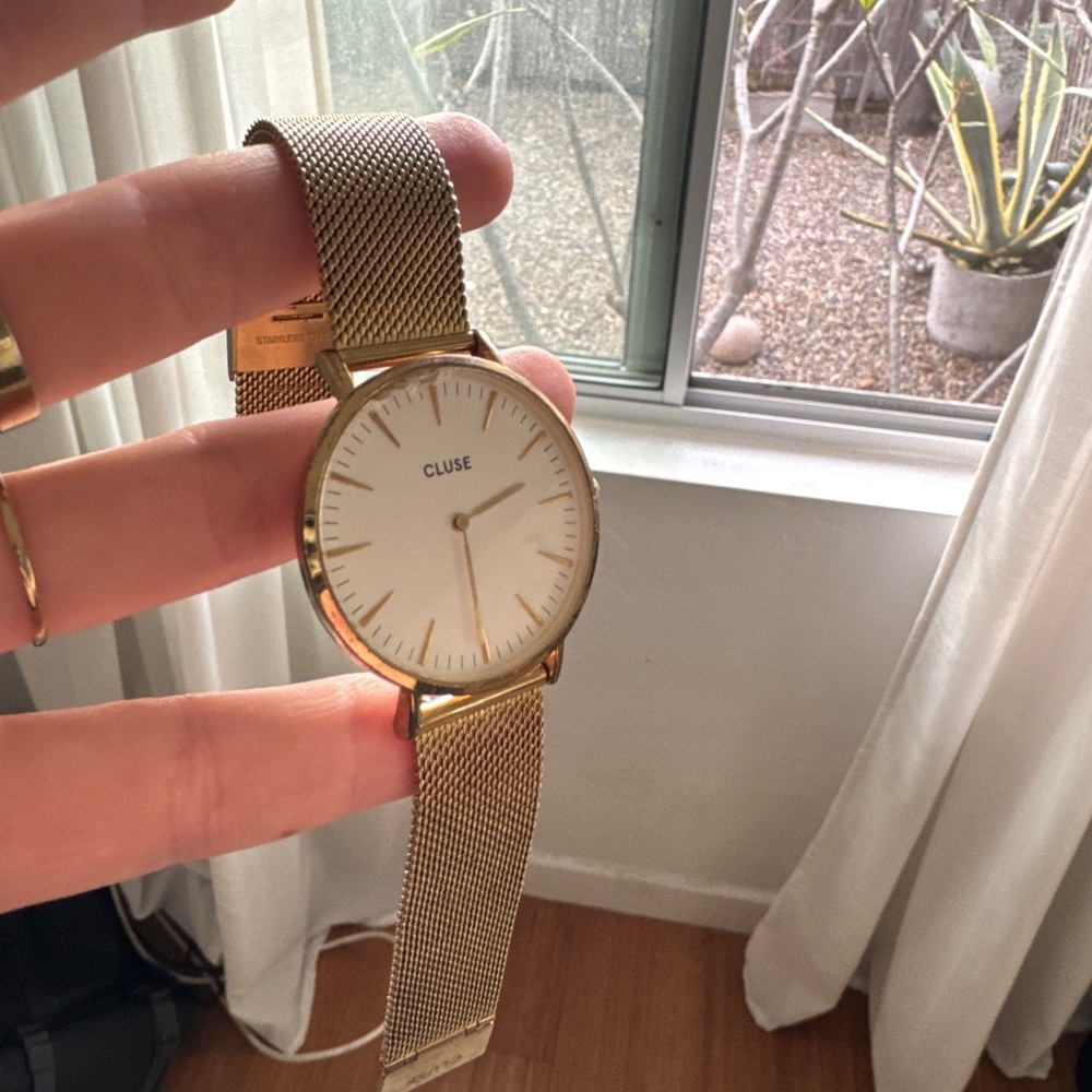 Gold Cluse watch with changeable band leather
